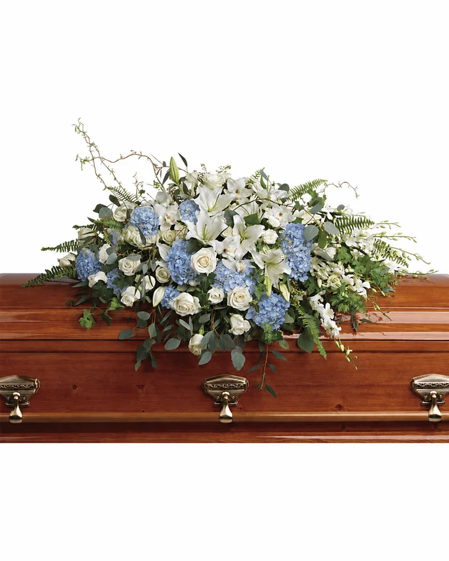 Powder blue, cream white and ivory casket spray