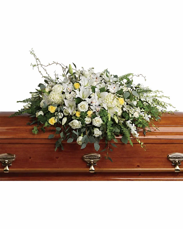 Butter yellow and cream white casket spray